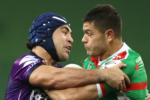 Jahrome Hughes, left, finished the Storm's round four clash against South Sydney before addressing his injury. 
