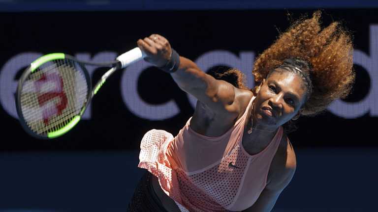 Slow start: Serena Williams serves against Maria Sakkari of Greece at the Hopman Cup in Perth.