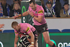 Isaah Yeo clutches at an injured pec.