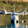 The ultimate in glamorous arrivals – a 1947 Grumann G-73 Mallard flying boat.