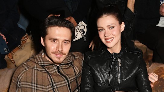 Brooklyn Beckham and Nicola Peltz at the Burberry winter 2025 show at the Tate Britain.
