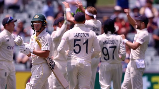 Marcus Harris walks off after being caught. 