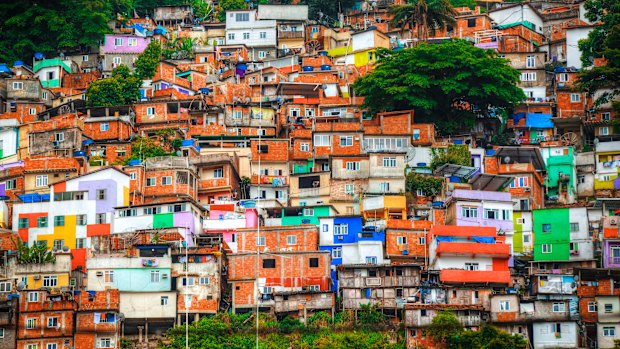 From a distance, Rio’s colourful favelas look appealing.