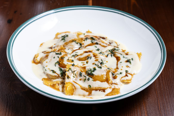 Duck ravioli with burnt butter and parmesan foam.