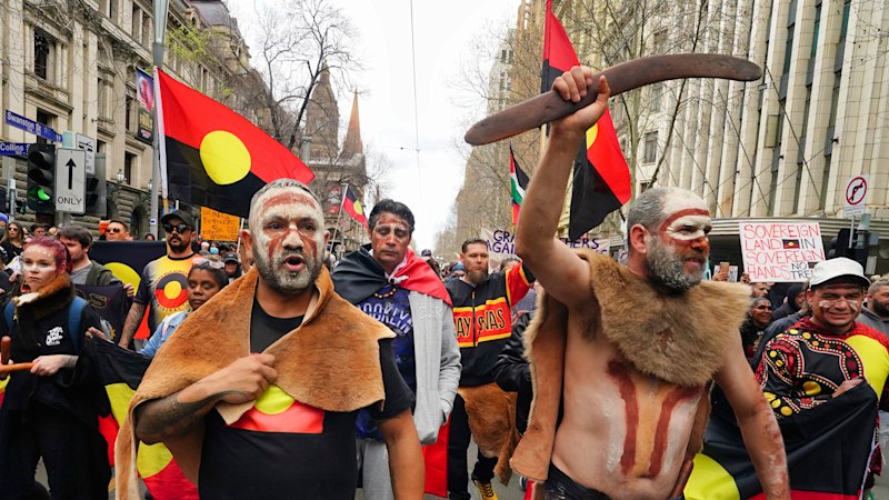 Scuffles break out as four competing rallies converge on Melbourne