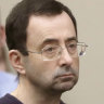 Larry Nassar victims reach $US380m settlement with USA Gymnastics, Olympic committee