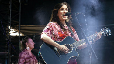 Missy Higgins performing in the forecourt at the Sydney Opera House.