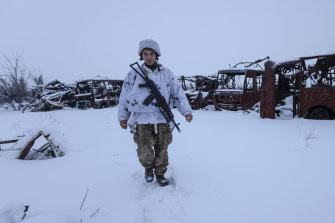 A Ukranian solider walks the line of separation from pro-Russian rebels in Donetsk. 