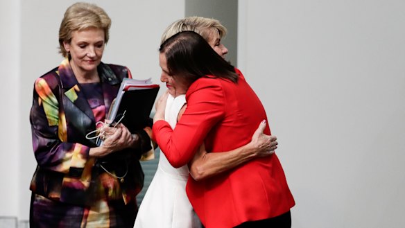 Julie Bishop and Kelly O'Dwyer embrace after the former foreign minister announced her retirement from politics. 