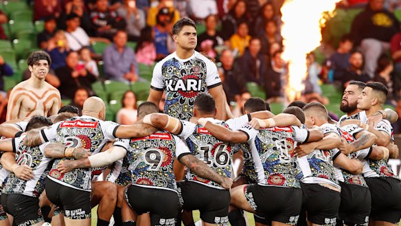 Pride on show: Indigenous players perform a traditional war cry before the  All Stars clash.