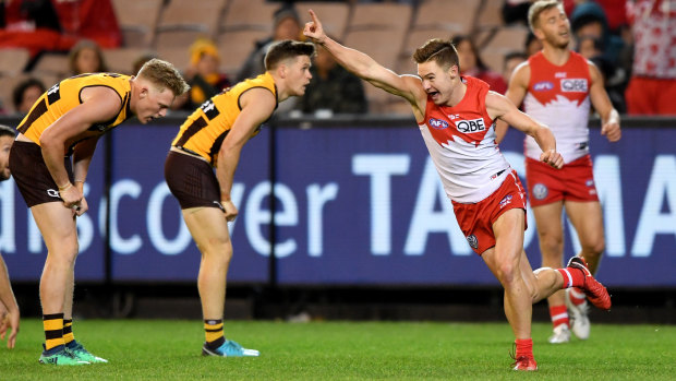 Rocking rookie: Ben Ronke celebrates his sixth of seven goals for the Swans against the Hawks.