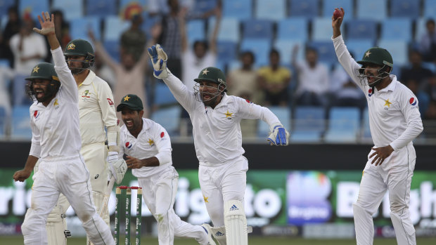Pakistan players appeal in vain for the dismissal of Australia's batsman Nathan Lyon on Thursday.