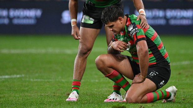 Latrell Mitchell is consoled after full-time.