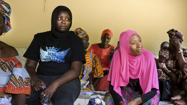 Residents of Sintet, Gambia, at a workshop to discuss kidnappings and torture of people accused of witchcraft roundups 10 years ago ordered by the president.  