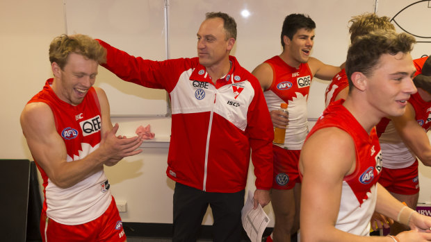 Swans coach John Longmire wants to move on from Dane Rampe's post-siren decision to climb the goal post.