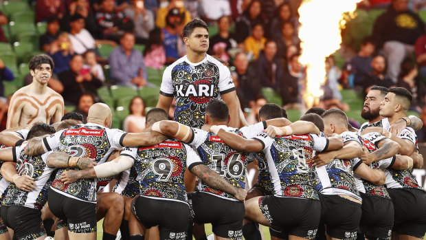 Pride on show: Indigenous players perform a traditional war cry before the  All Stars clash.