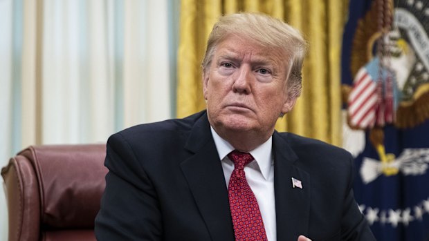 US President Donald Trump in the Oval Office before an interview on Thursday.