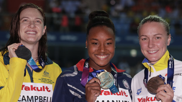 Golden girl: Simone Manuel (centre) smashed her personal-best time to defeat Cate Campbell (left) and Sarah Sjostrom.