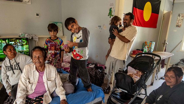 Full house: Damien Dutton and extended family at their Wilcannia home.