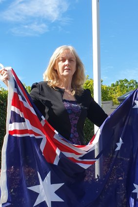 Calamvale Ward councillor Angela Owen outside her office in Calamvale after the Australian flag was stolen three times.