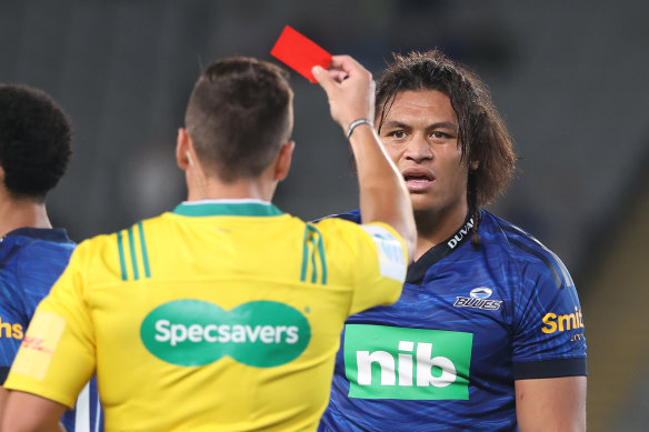 Blues winger Caleb Clarke is shown a red card.