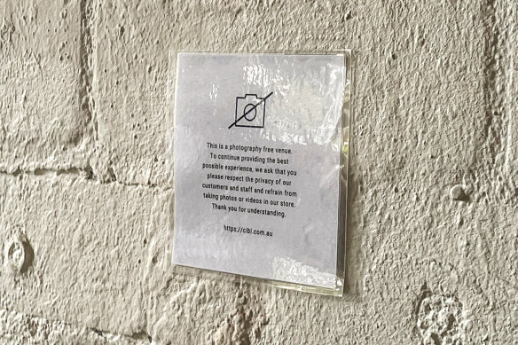 Cibi’s signs banning photos and videos at the cafe and design store. 