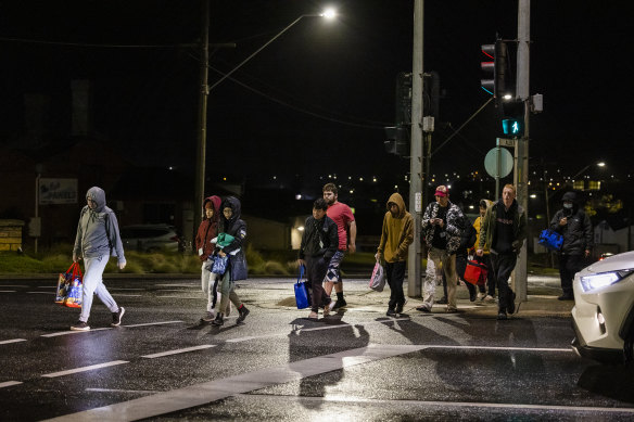 Workers on their way to a shift at Midfield Meats.  