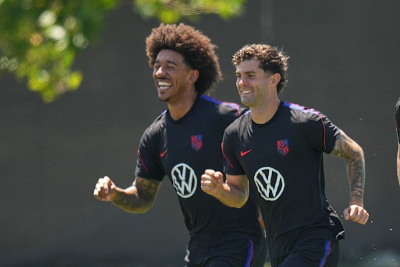 Christian Pulisic (right) and Chris Richards attend a training session ahead of their FIFA World Cup match against Turkey.