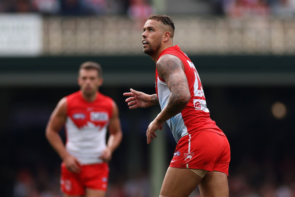 Lance Franklin keeps an eye on the ball as he slots a goal against the Giants.