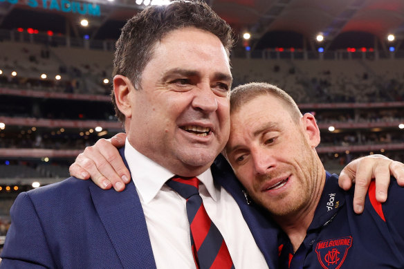 Melbourne great Garry Lyon with coach Simon Goodwin after the Demons’ 2021 premiership. Lyon was one of the interviewers tasked with quizzing Goodwin about the club’s culture on SEN radio this week.