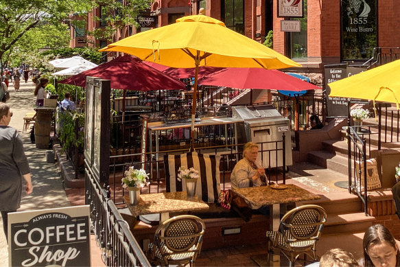 A cafe in a fashionable corner of Boston.