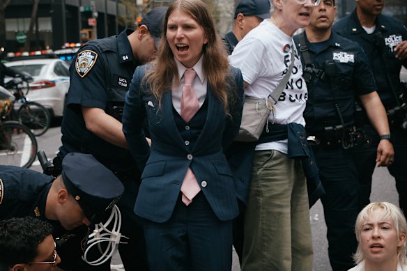 Chelsea Manning is arrested by police as protesters with Jewish Voice for Peace block traffic during a demonstration outside the New York office of US Senator Chuck Schumer.