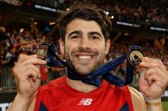 Christian Petracca with the Norm Smith and premiership medals