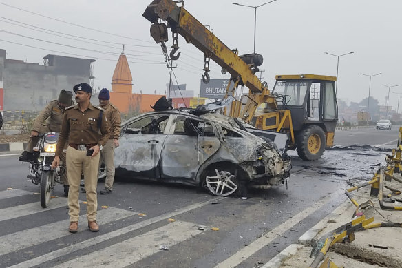 Police officers investigate the scene of Rishabh Pant’s car accident near Roorkee, in the northern Indian state of Uttarakhand.