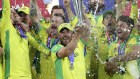 Australia’s captain Aaron Finch raises T20 World Cup trophy.