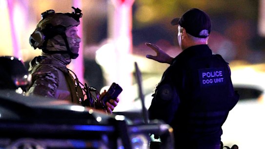 Heavily armed NSW Police at the scene of the Bondi attack.