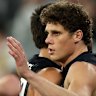 Charlie Curnow of the Blues is congratulated by Ashton Moir after kicking a goal.