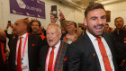 GWS Giants chairman Tony Shepherd belts out the club song with Stephen Coniglio of the Giants (right).