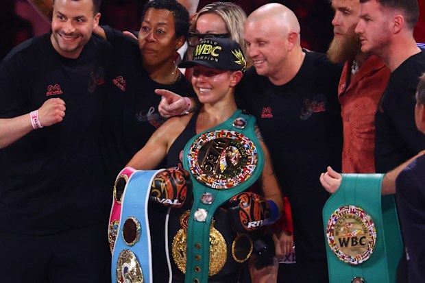 Cherneka Johnson celebrates becoming undisputed world champion.