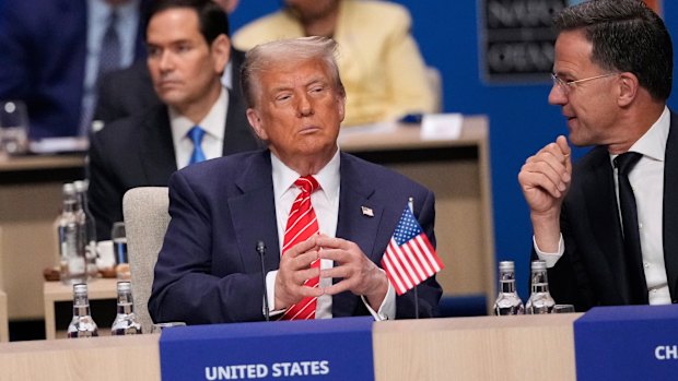 Flattery will get you everywhere: President Donald Trump and NATO Secretary General Mark Rutte at the plenary session.