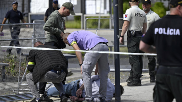 Police arrest a man after Slovak Prime Minister Robert Fico was shot and injured.
