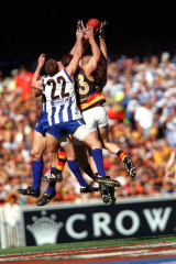 Players compete for a mark in the grand final.