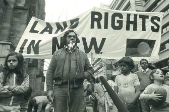 Yvonne Weldon, pictured left, stands next to her uncle, the Indigenous activist Paul Coe, as he speaks at a protest in 1978.