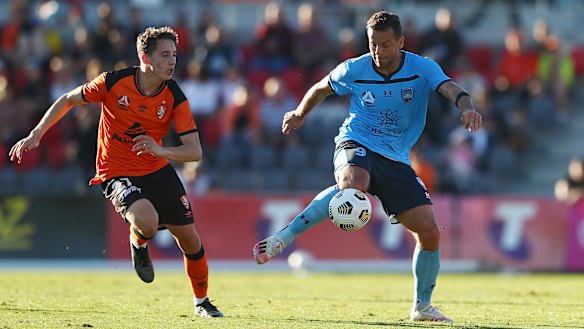 Bobo controls the ball against the Roar in Brisbane.