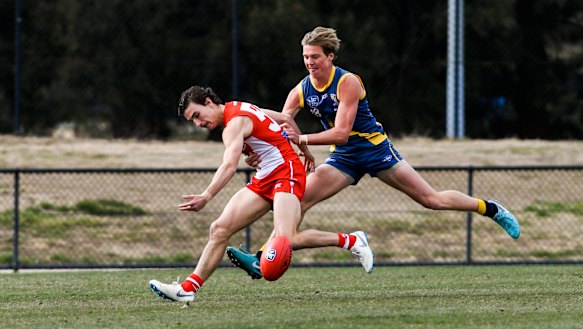 Angus Baker (right).