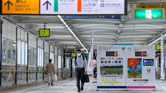 Fukushima station on Wednesday as the opening game of the Olympics begins nearby. 