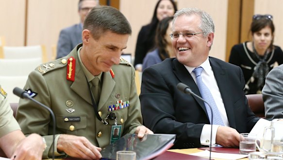 Lieutenant-General Angus Campbell and then immigration minister Scott Morrison during a Senate estimates hearing in 2014.