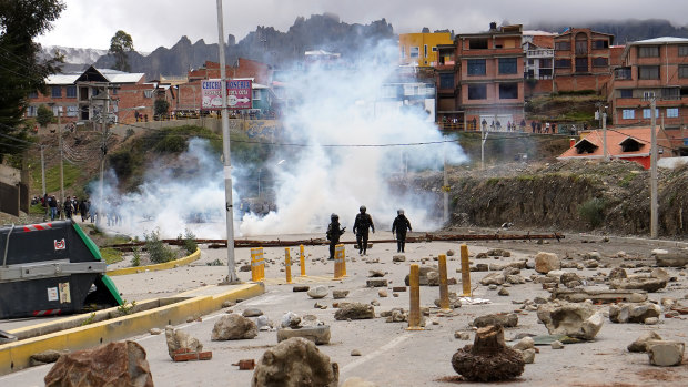 Stones and pieces of wood thrown by pro-Evo Morales demonstrators in the street during clashes with police in La Paz, Bolivia. 