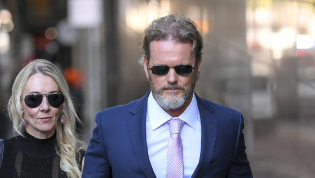 Craig McLachlan arrived at Melbourne Magistrates Court on Friday with his partner Vanessa Scammell.