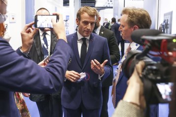French President Emmanuel Macron speaks to Australian reporters on the sidelines of the G20 in Rome.
